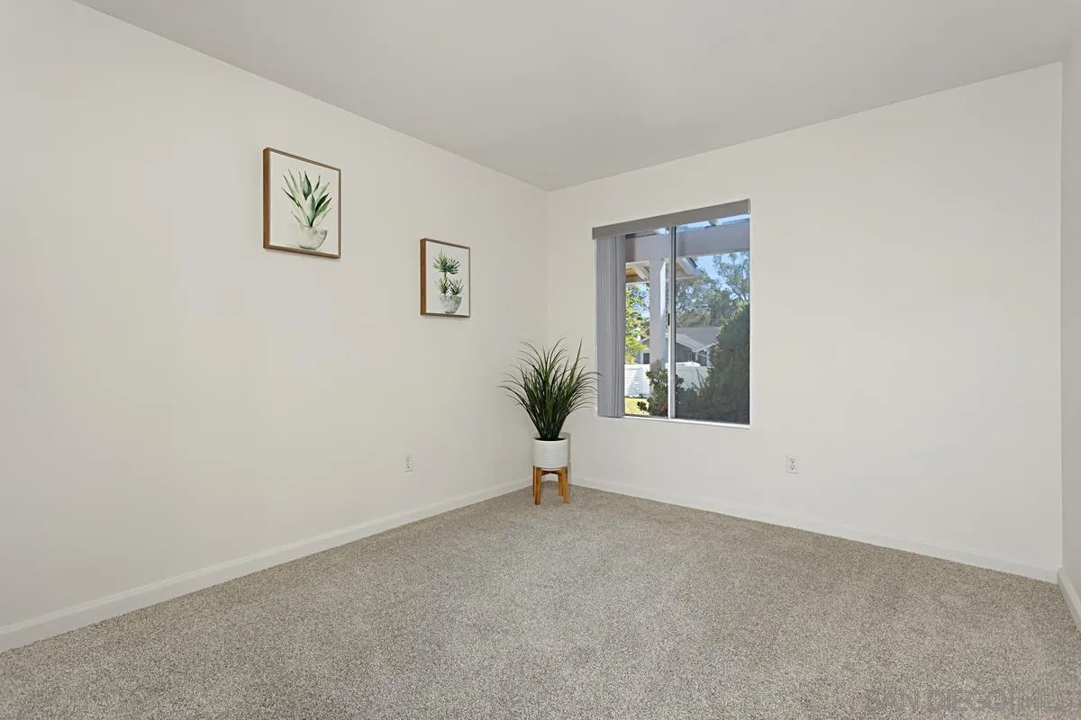 4520 Trieste Drive Carlsbad, CA 92010 - Photo 18 of 27 a view of an empty room with a window