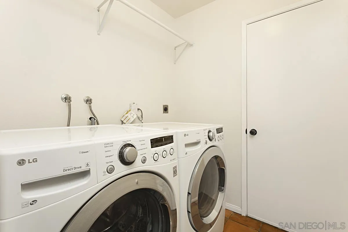 4520 Trieste Drive Carlsbad, CA 92010 - Photo 24 of 27 a utility room with dryer and washer