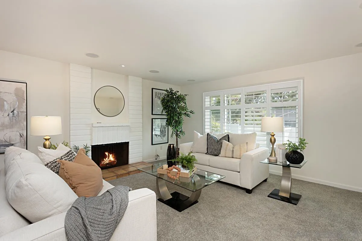 4520 Trieste Drive Carlsbad, CA 92010 - Photo 3 of 27 a living room with furniture and a fireplace