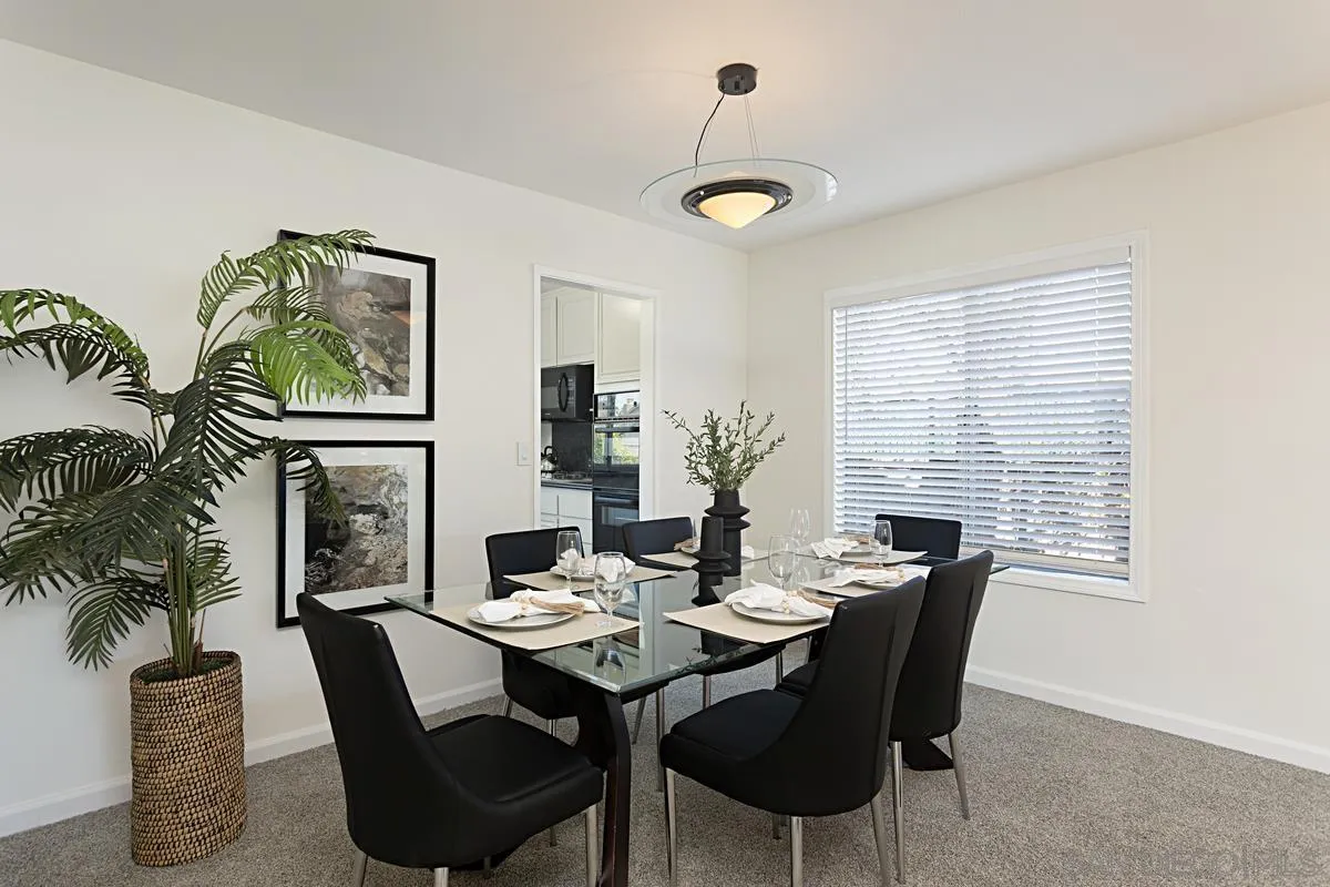 4520 Trieste Drive Carlsbad, CA 92010 - Photo 5 of 27 a view of a dining room with furniture window and outside view