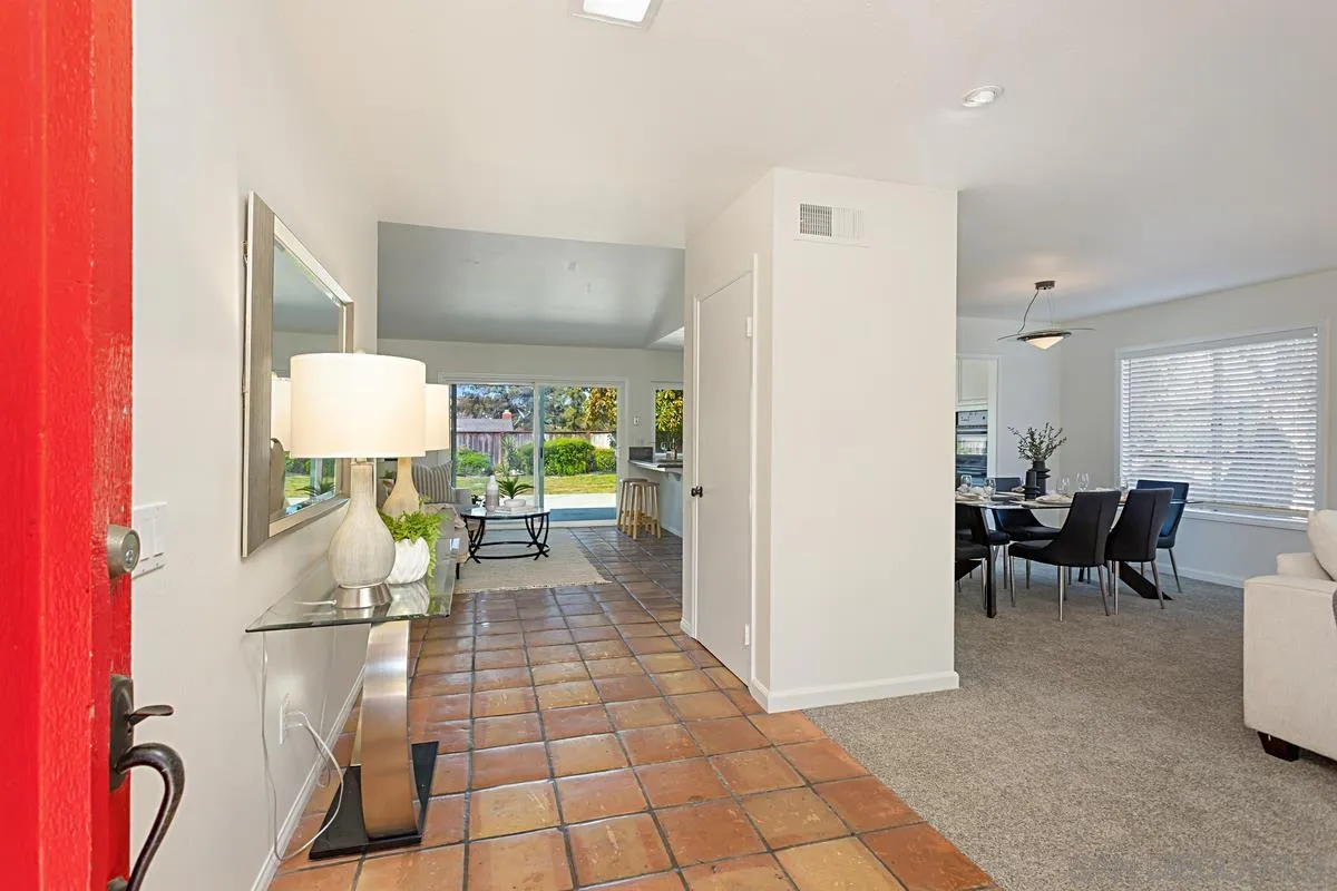 4520 Trieste Drive Carlsbad, CA 92010 - Photo 7 of 27 a living room with furniture and a table