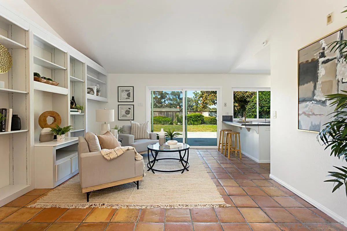 4520 Trieste Drive Carlsbad, CA 92010 - Photo 8 of 27 a living room with furniture rug and a large window