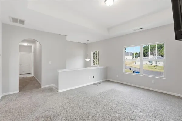 an empty room with windows