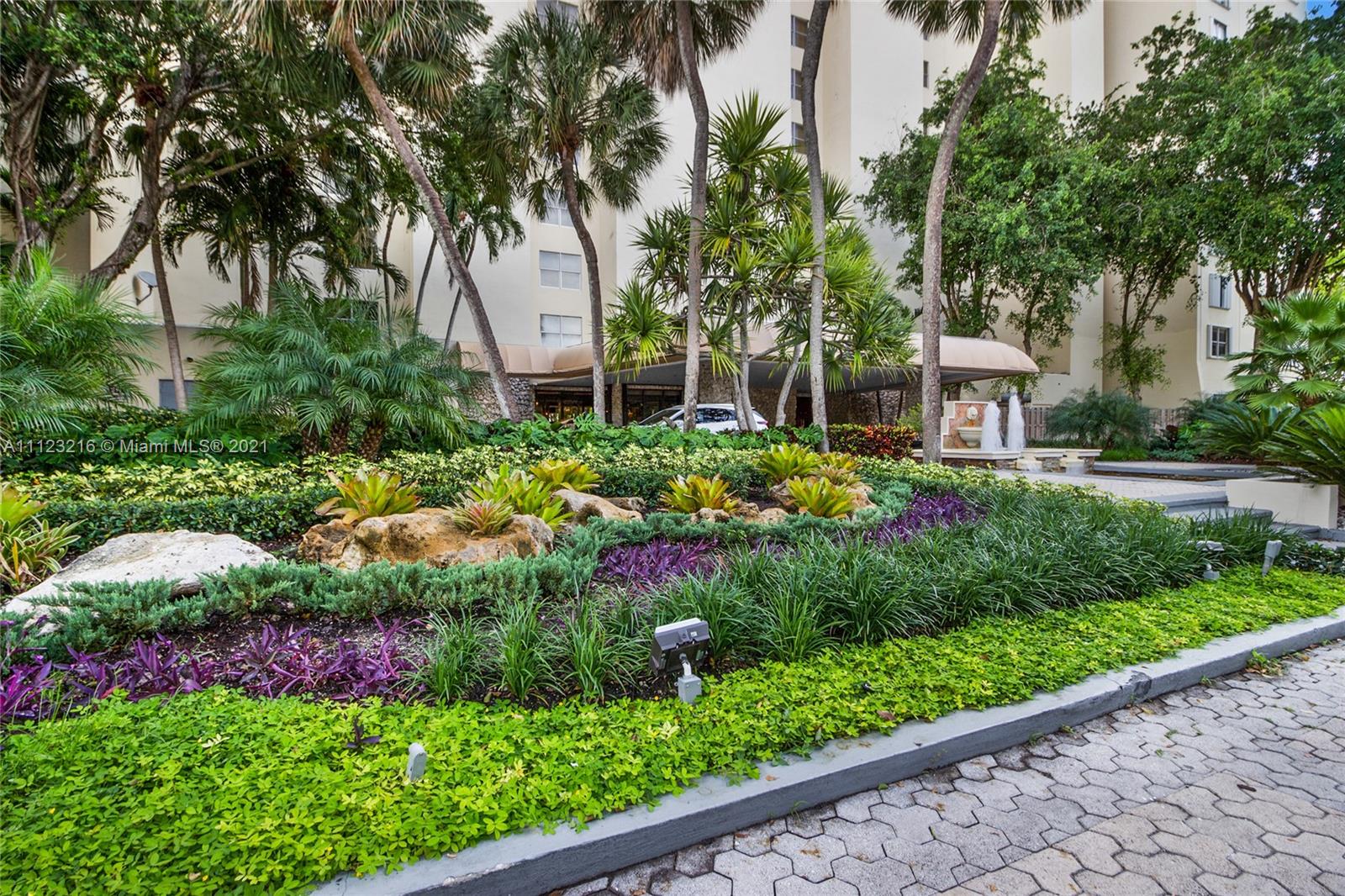 11111 Biscayne Boulevard, Unit 7C Miami, FL 33181 - Photo 17 of 18 a view of a garden with plants