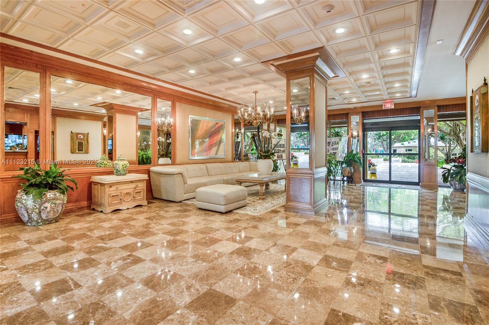 11111 Biscayne Boulevard, Unit 7C Miami, FL 33181 - Photo 18 of 18 a living room with furniture