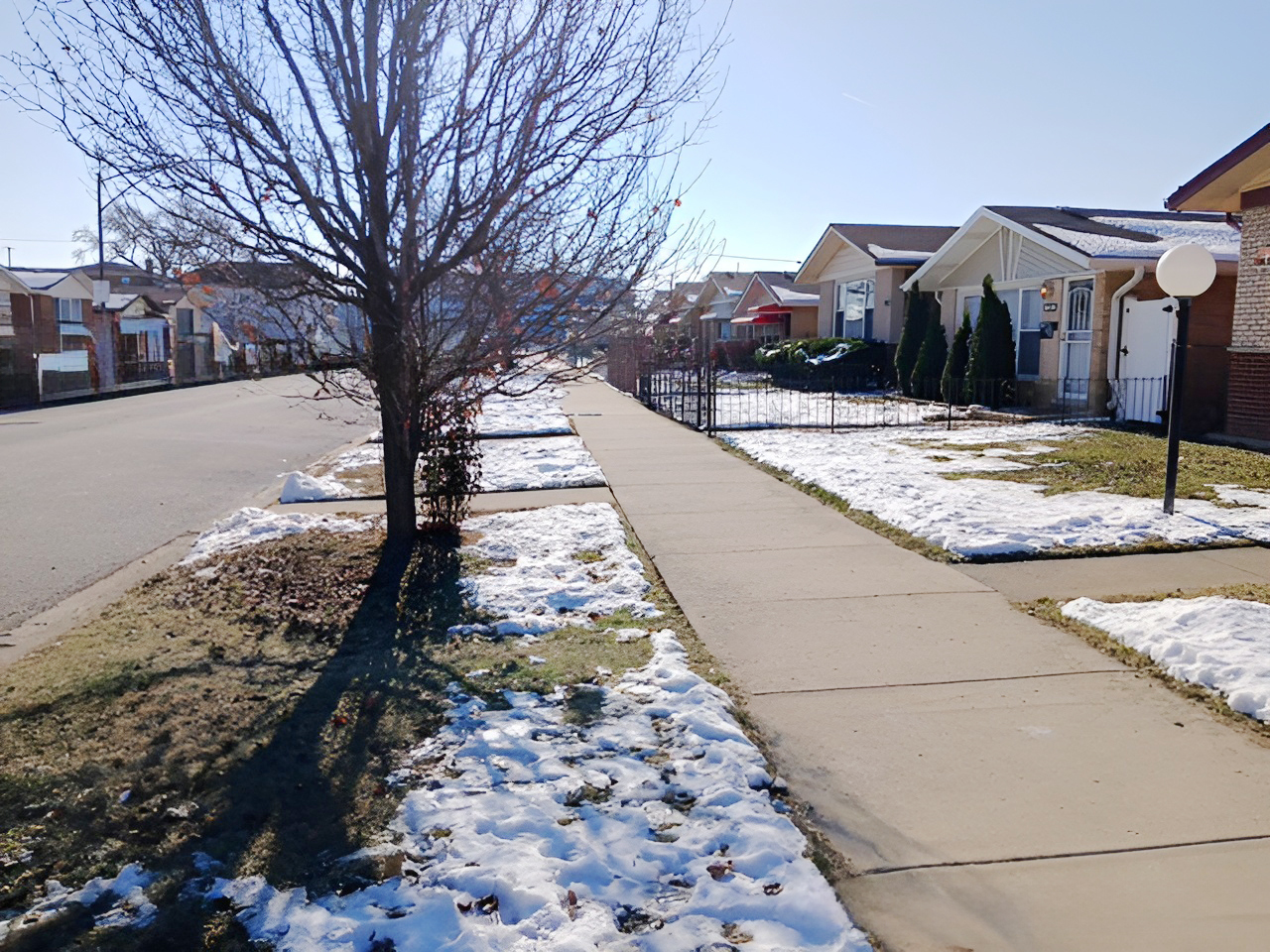 11818 South Justine Street Chicago, IL 60643 - Photo 2 of 14 a view of a yard with snow on the road