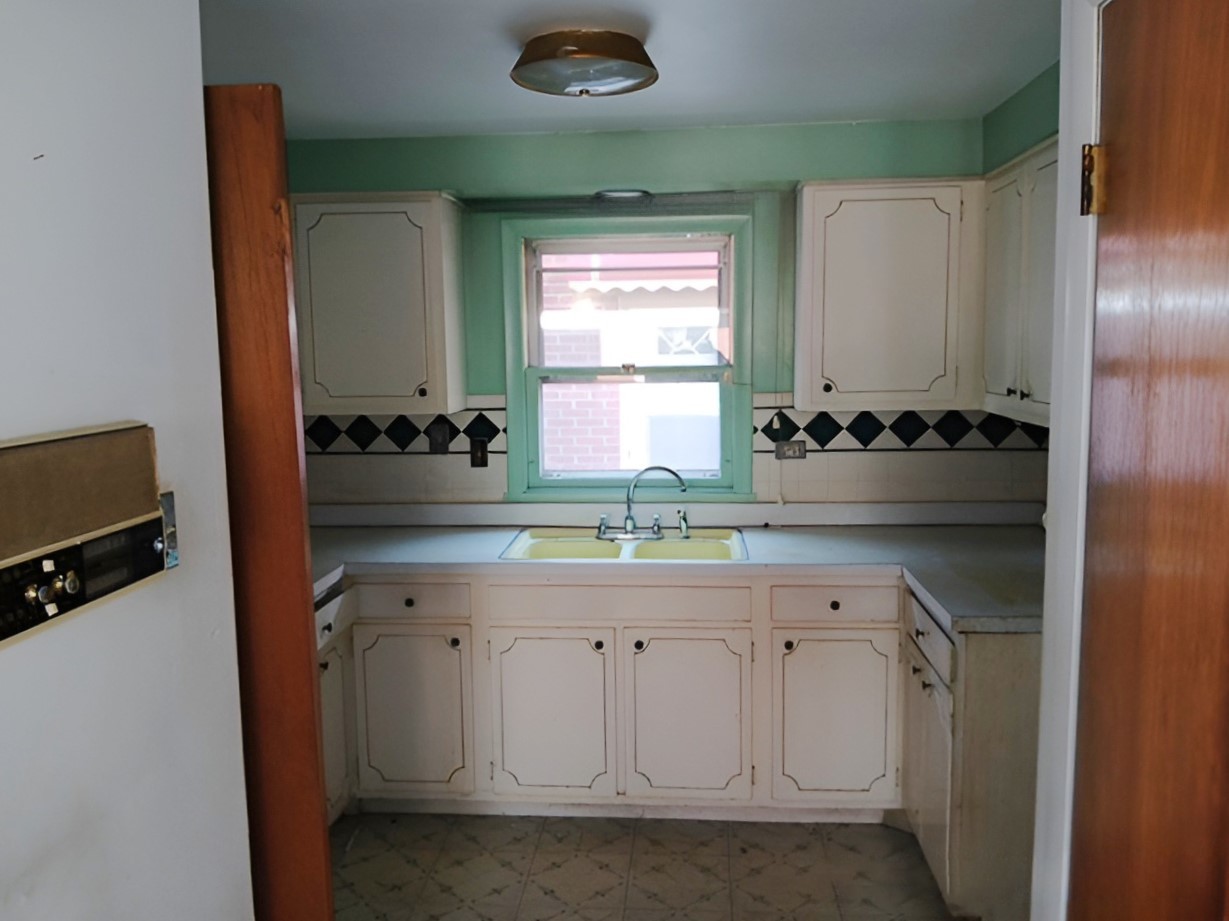 11818 South Justine Street Chicago, IL 60643 - Photo 8 of 14 a bathroom with a granite countertop sink a large mirror and a window