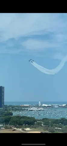 a view of a lake with a yard