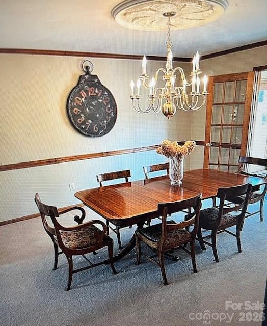 40659 Ridenhour Road Richfield, NC 28137 - Photo 12 of 24 a dining room with furniture and chandelier