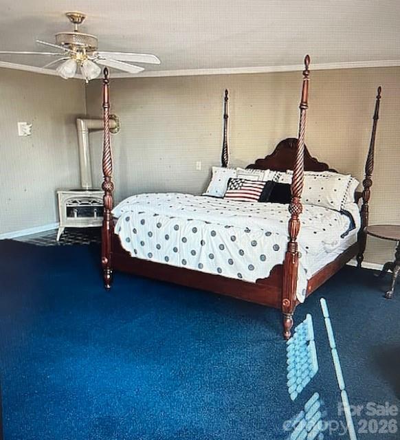 40659 Ridenhour Road Richfield, NC 28137 - Photo 14 of 24 a bedroom with a bed a chandelier and dresser