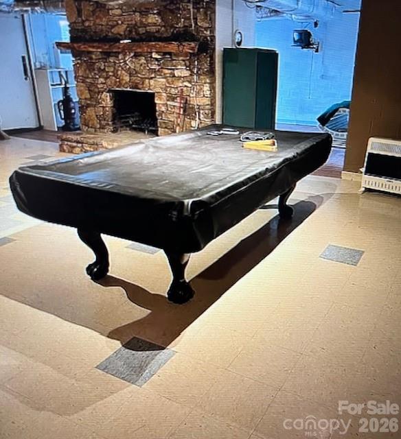40659 Ridenhour Road Richfield, NC 28137 - Photo 19 of 24 a living room with furniture and a fireplace