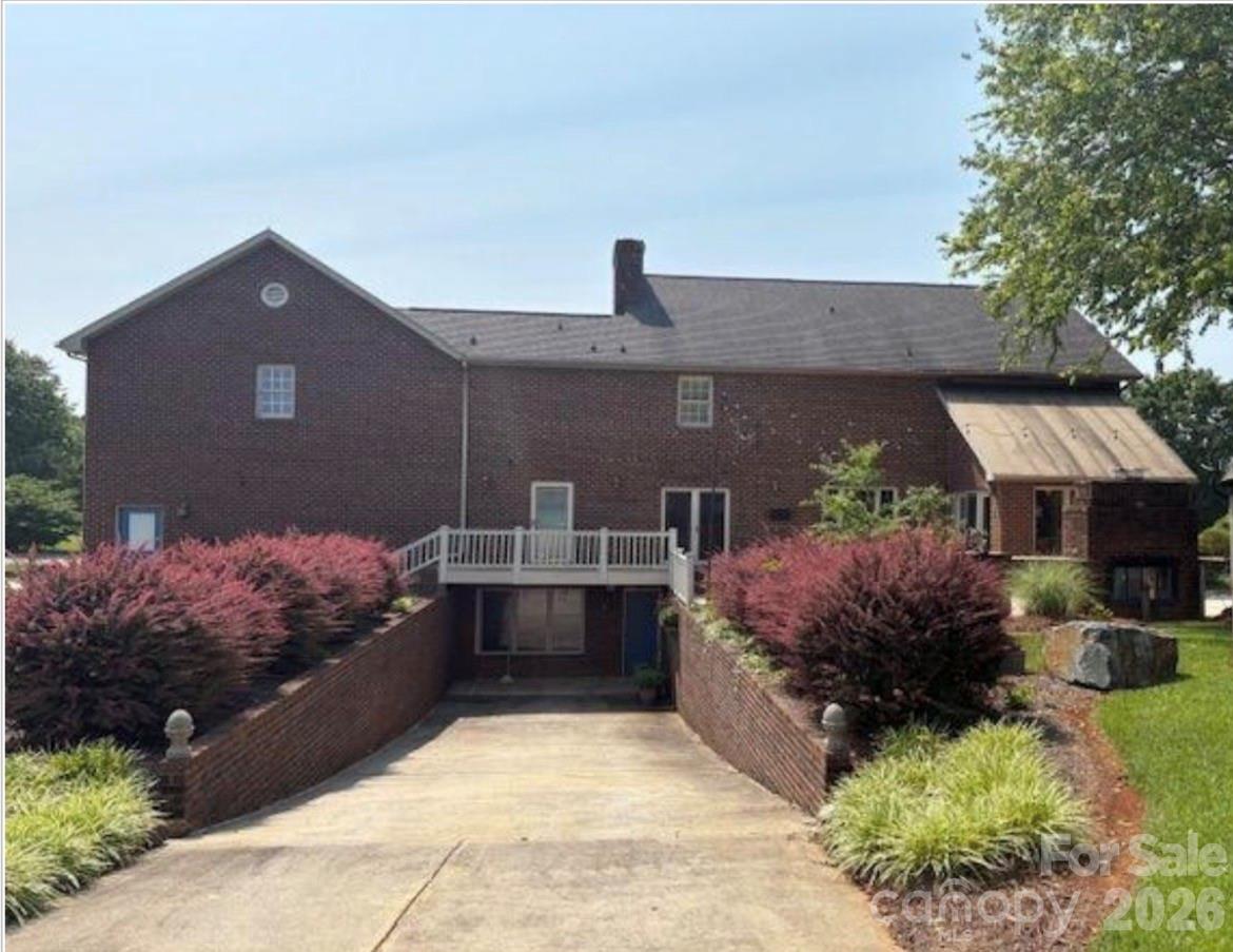 40659 Ridenhour Road Richfield, NC 28137 - Photo 2 of 24 a front view of a house with a yard