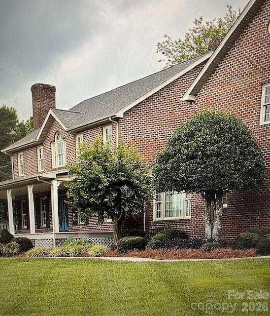 40659 Ridenhour Road Richfield, NC 28137 - Photo 3 of 24 a front view of a house with a yard
