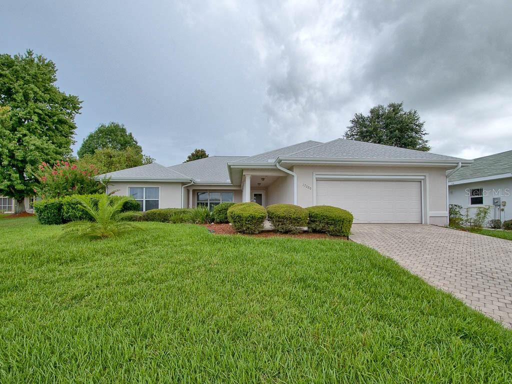 Front Elevation of this fabulous Royal Floridian split bedroom Pool Home