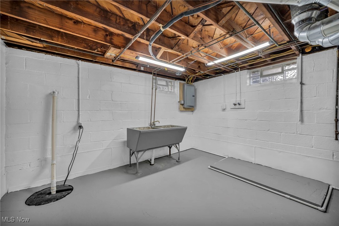 1560 Douglas Road Wickliffe, OH 44092 - Photo 33 of 39 Basement with drainage system and electric panel