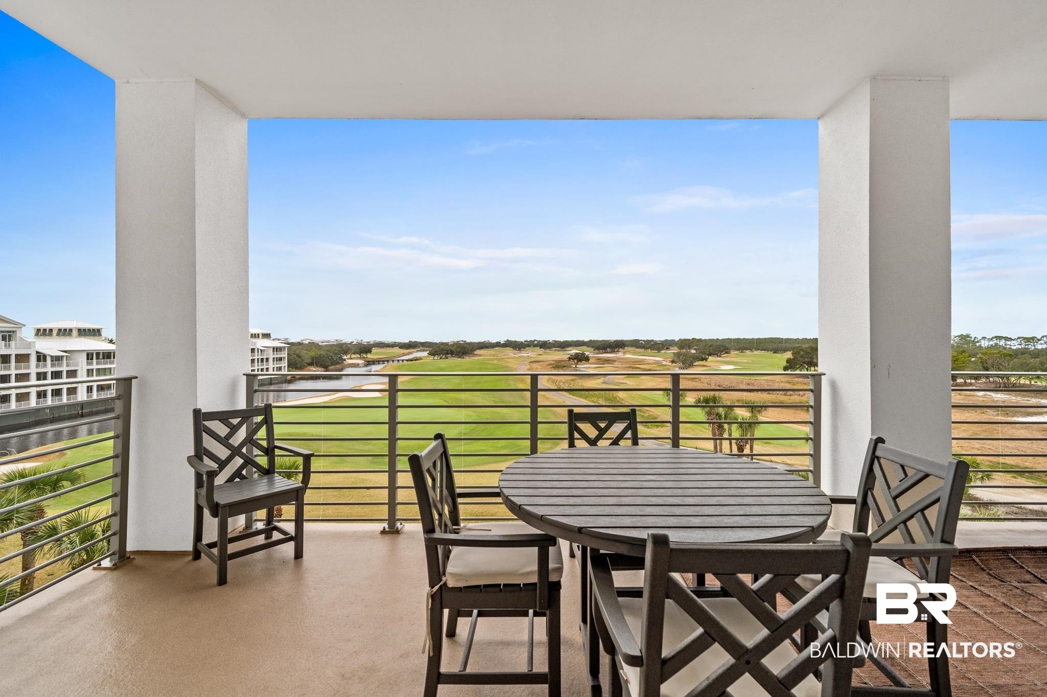 815 Plantation Road, Unit 405 Gulf Shores, AL 36542 - Photo 20 of 39 View of patio featuring a balcony