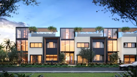 front view of residential houses with a yard