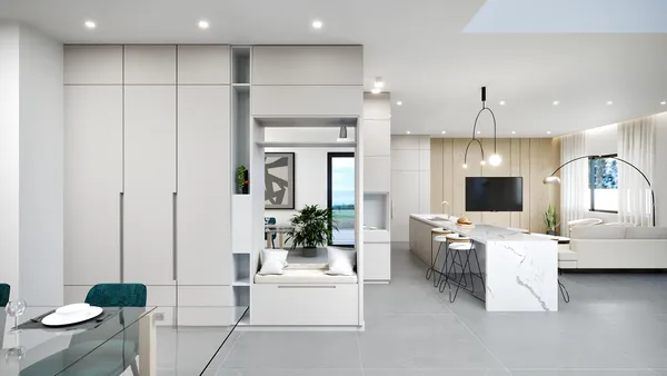 a view of a livingroom with furniture and window