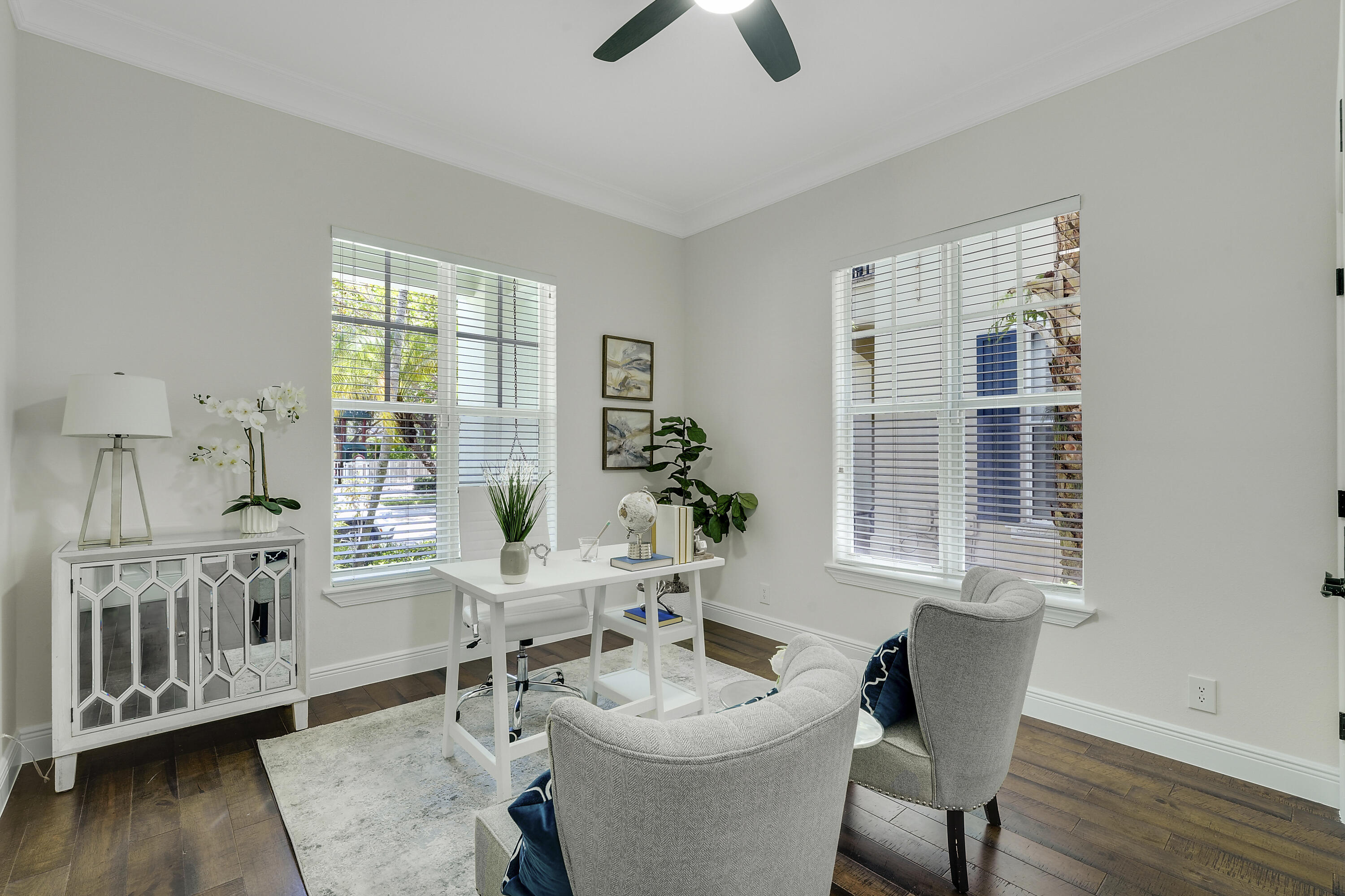 112 Spikerush Road Jupiter, FL 33458 - Photo 20 of 49 a dining room with furniture window and wooden floor