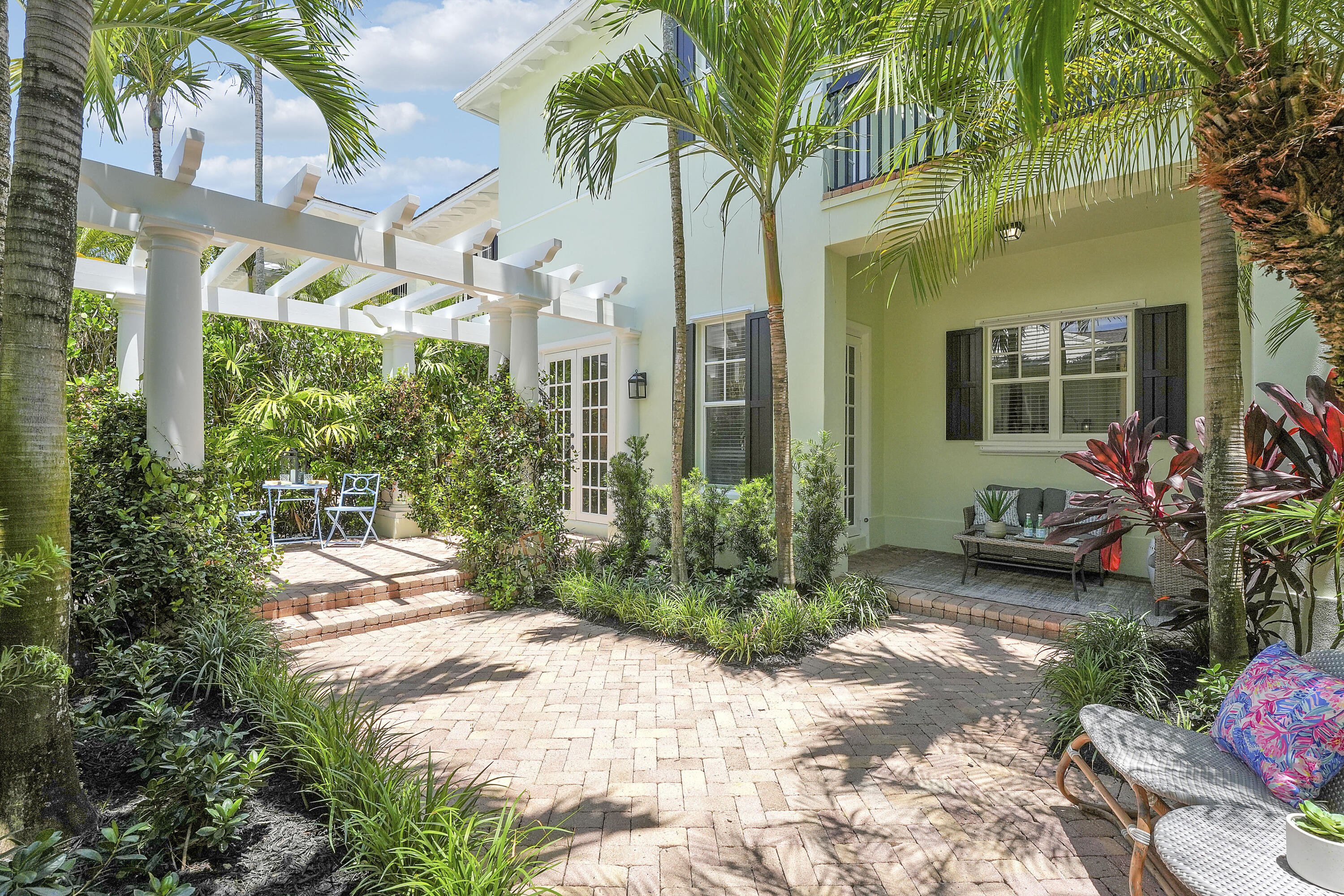 112 Spikerush Road Jupiter, FL 33458 - Photo 42 of 49 a view of a garden with a fountain