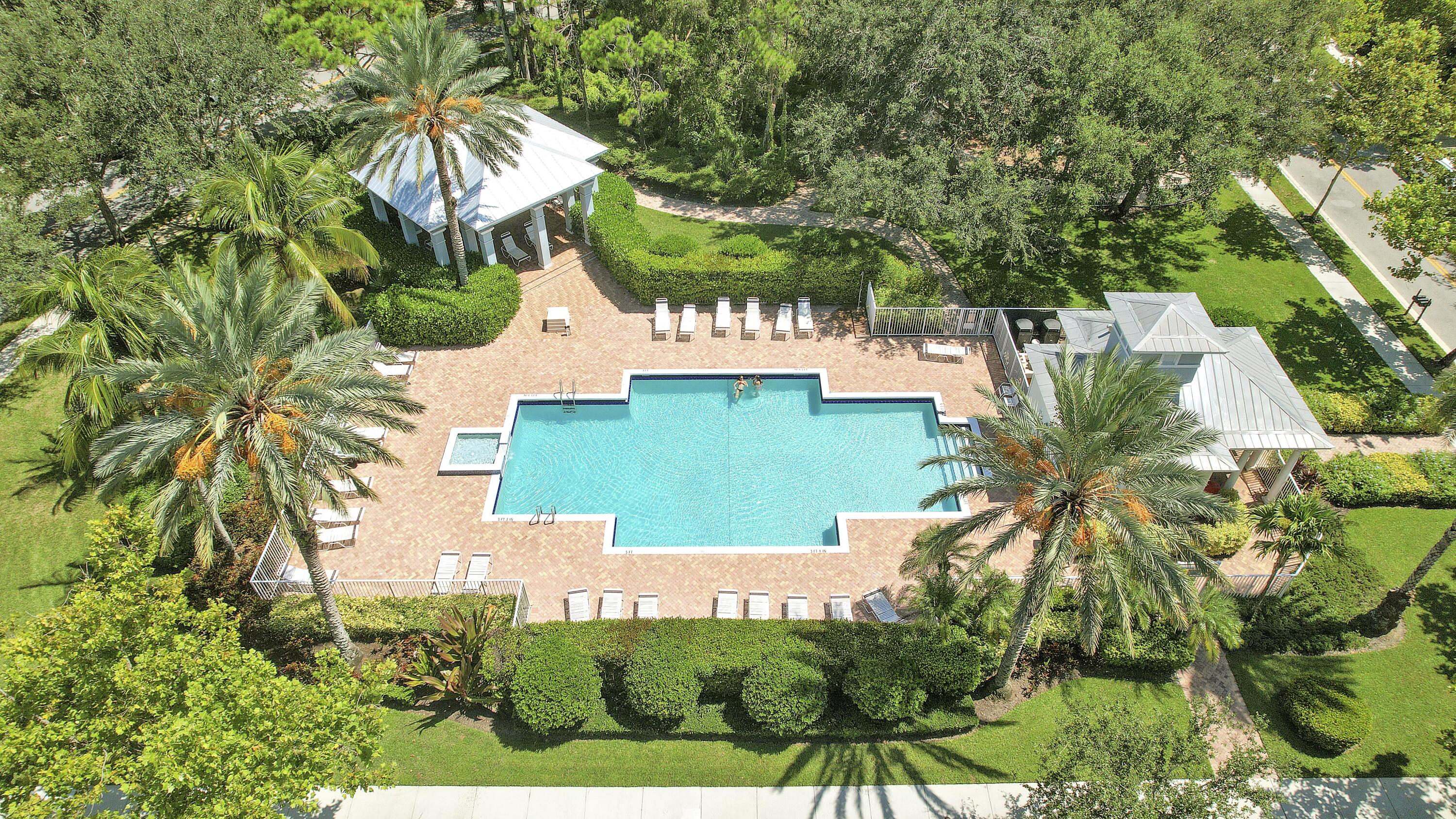 112 Spikerush Road Jupiter, FL 33458 - Photo 45 of 49 a view of a house with a yard