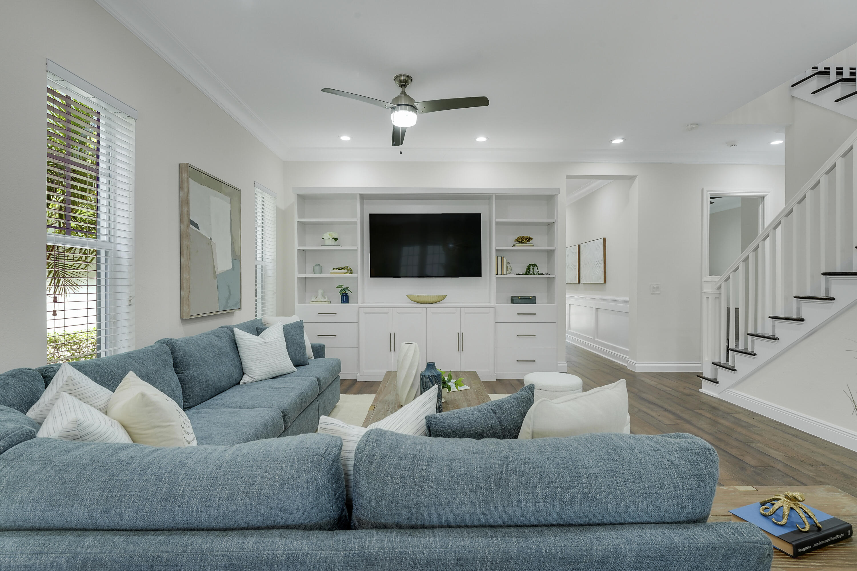 112 Spikerush Road Jupiter, FL 33458 - Photo 7 of 49 a living room with furniture and a flat screen tv