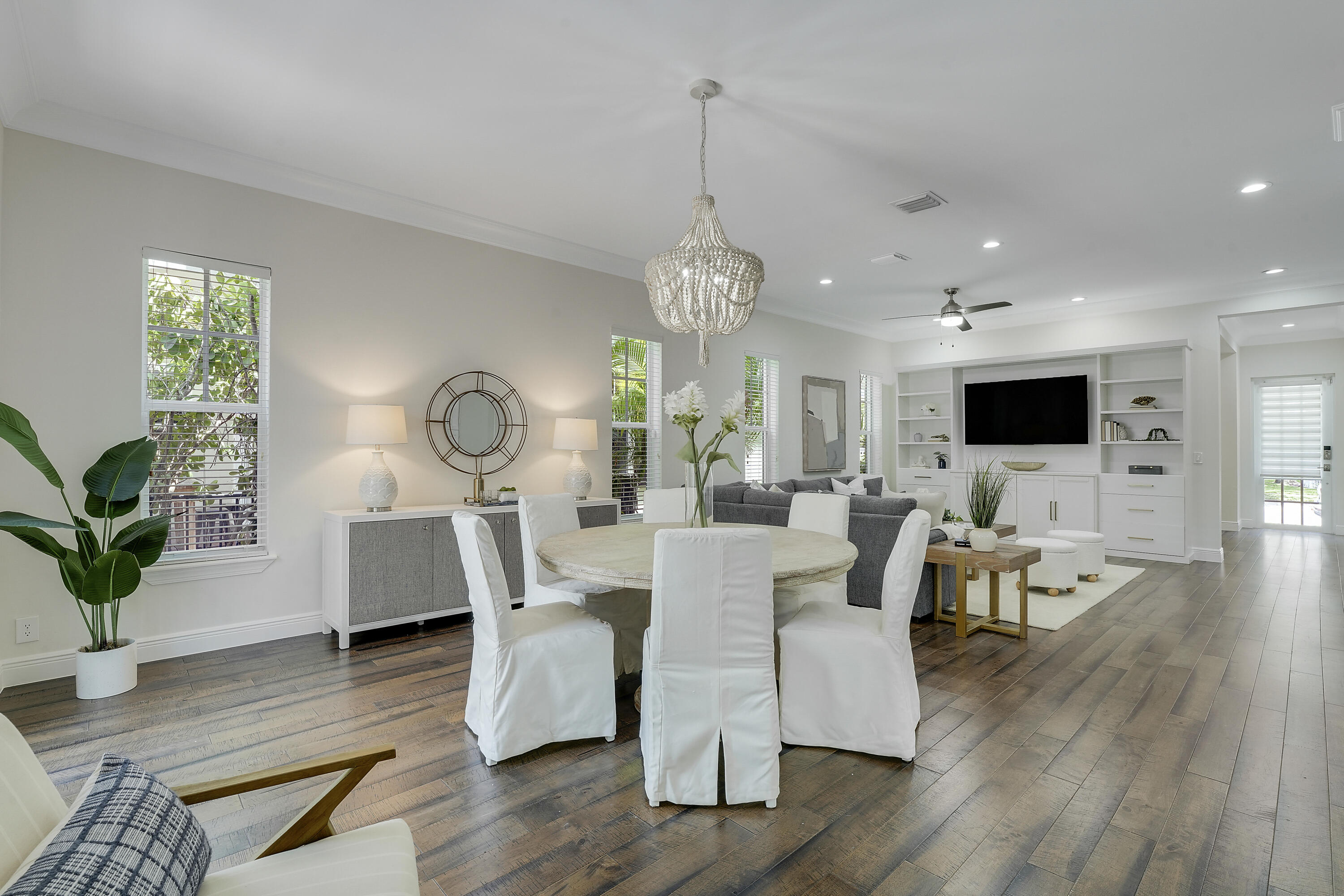 112 Spikerush Road Jupiter, FL 33458 - Photo 9 of 49 a living room with fireplace furniture and a flat screen tv