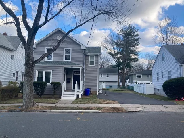 a view of a house with a street