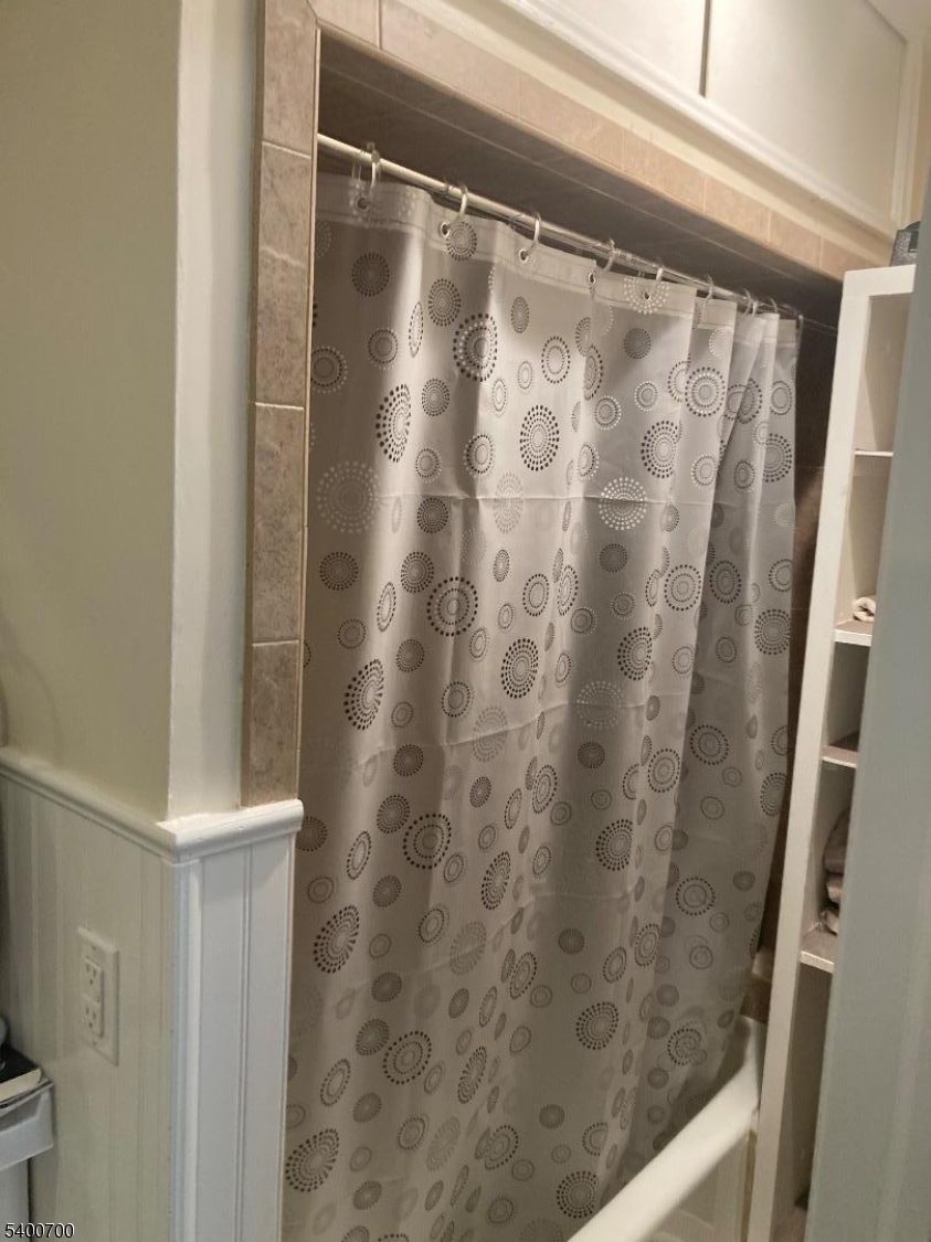 132 Stevens Avenue Little Falls, NJ 07424 - Photo 8 of 8 a bathroom with a shower