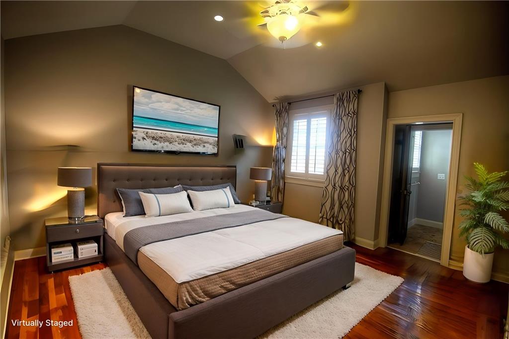 1620 High Trail Southeast Atlanta, GA 30339 - Photo 11 of 17 a spacious bedroom with a bed and wooden floor