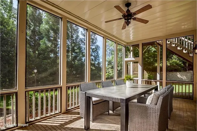 a view of a patio with a table chairs and a table