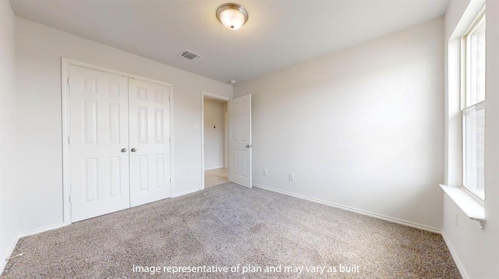 5800 Foggy Lagoon Drive Waco, TX 76708 - Photo 20 of 24 an empty room with windows