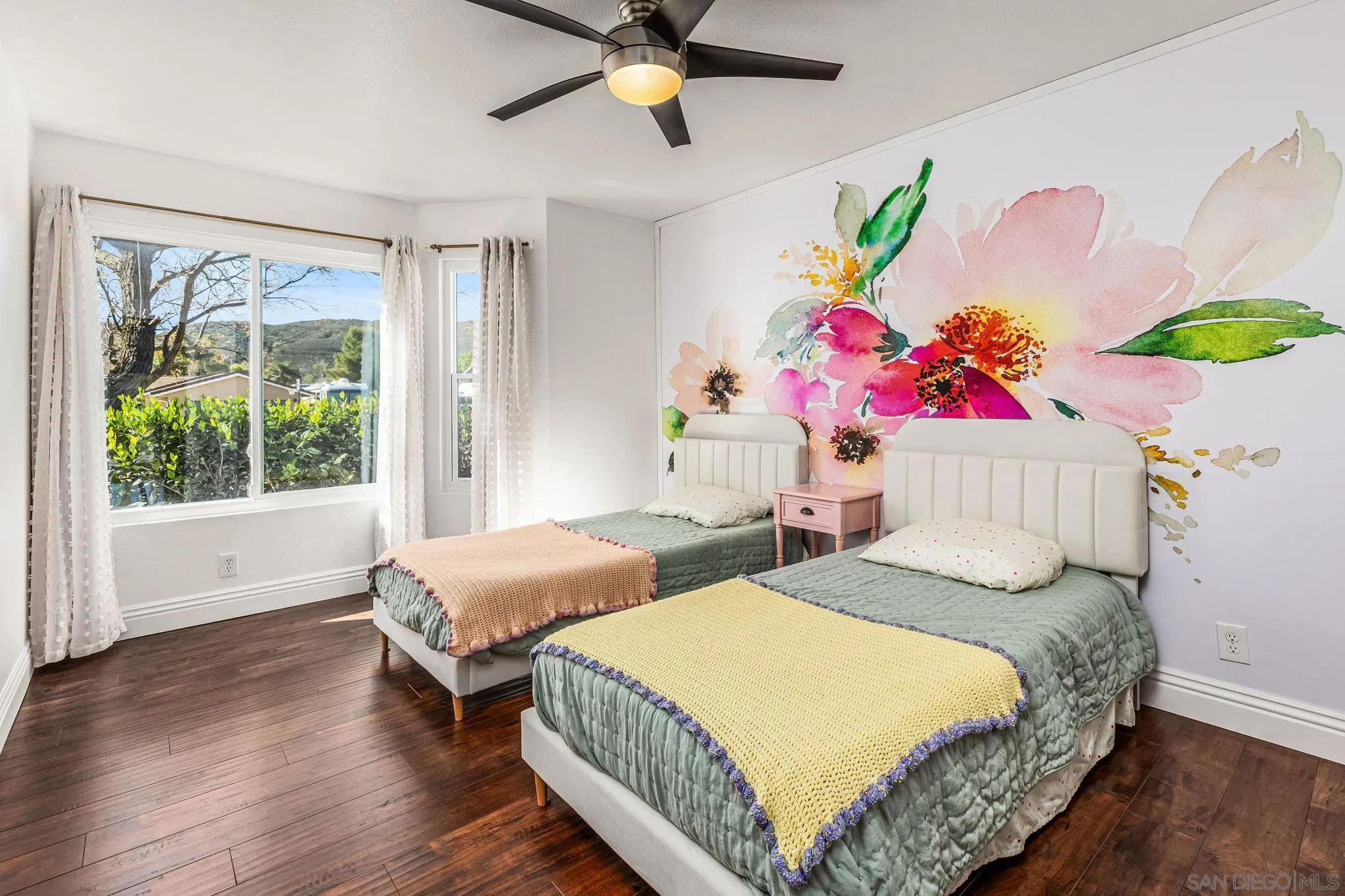 16319 Scarbery Road Ramona, CA 92065 - Photo 15 of 37 a bedroom with two beds and a window