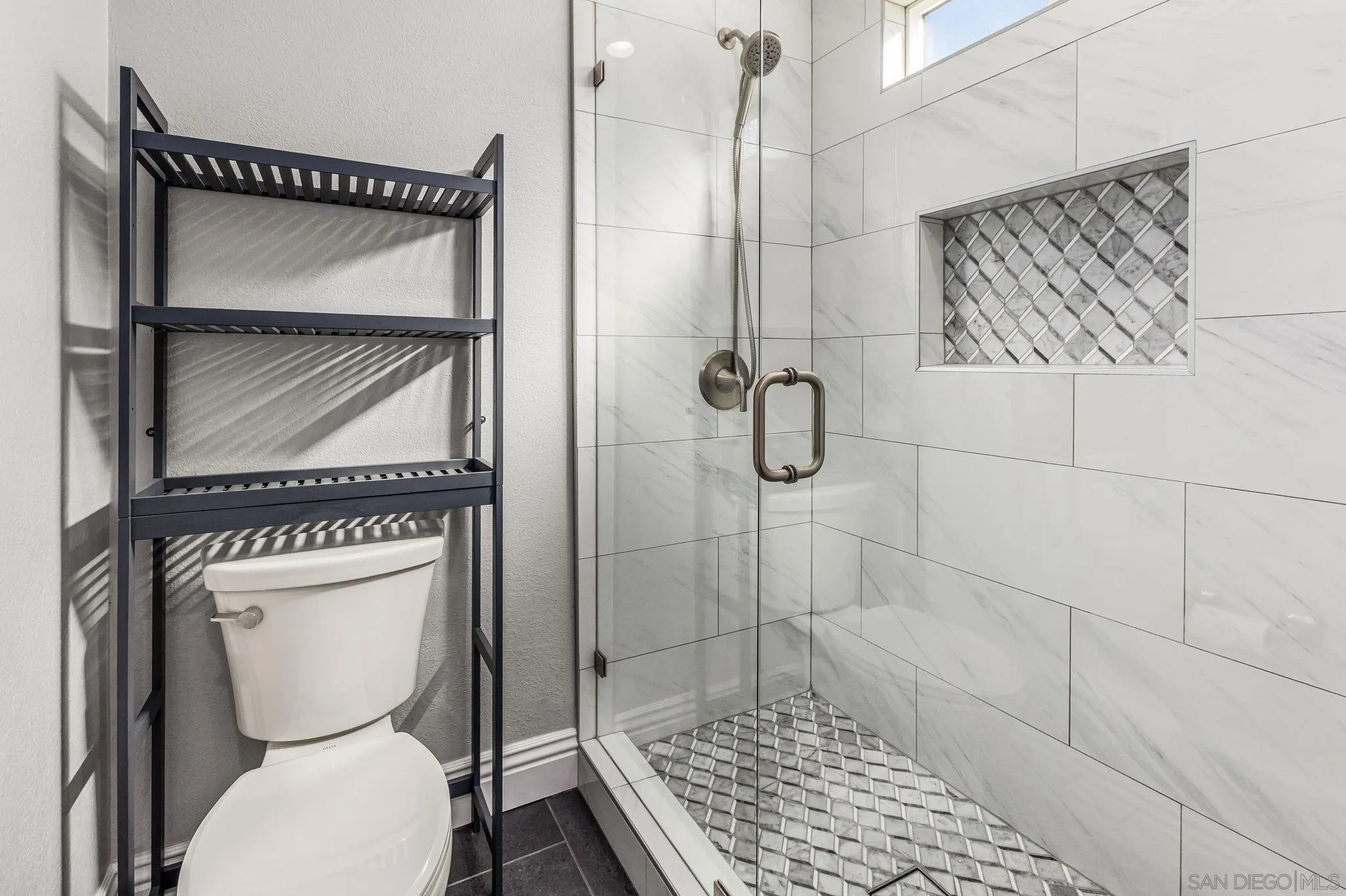 16319 Scarbery Road Ramona, CA 92065 - Photo 21 of 37 a bathroom with a toilet and a shower