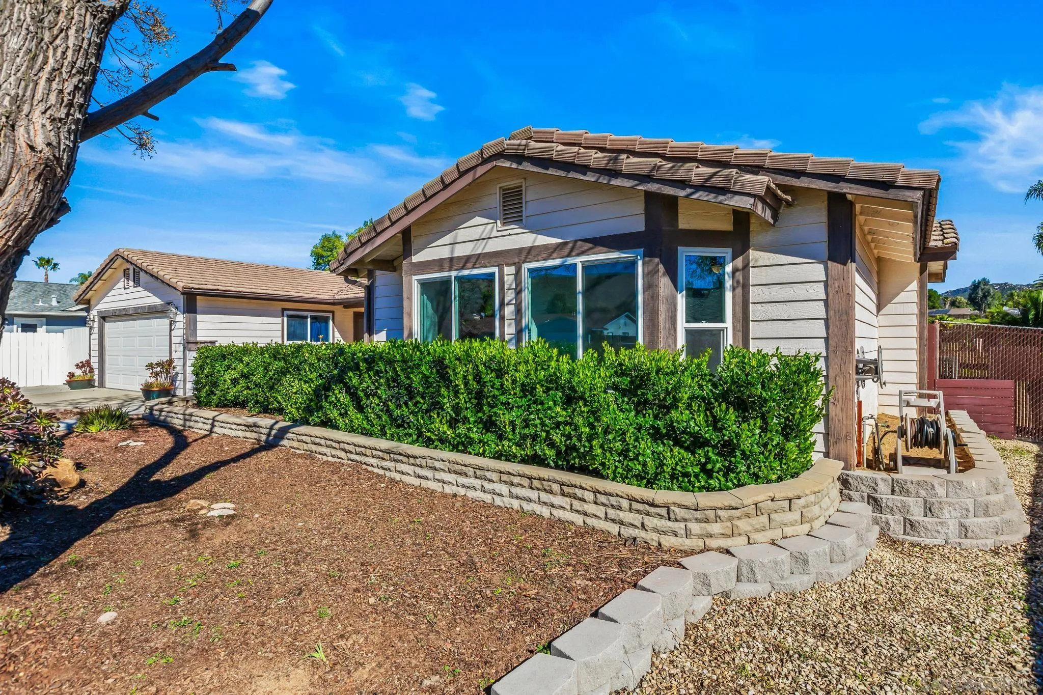 16319 Scarbery Road Ramona, CA 92065 - Photo 28 of 37 a front view of a house with a yard