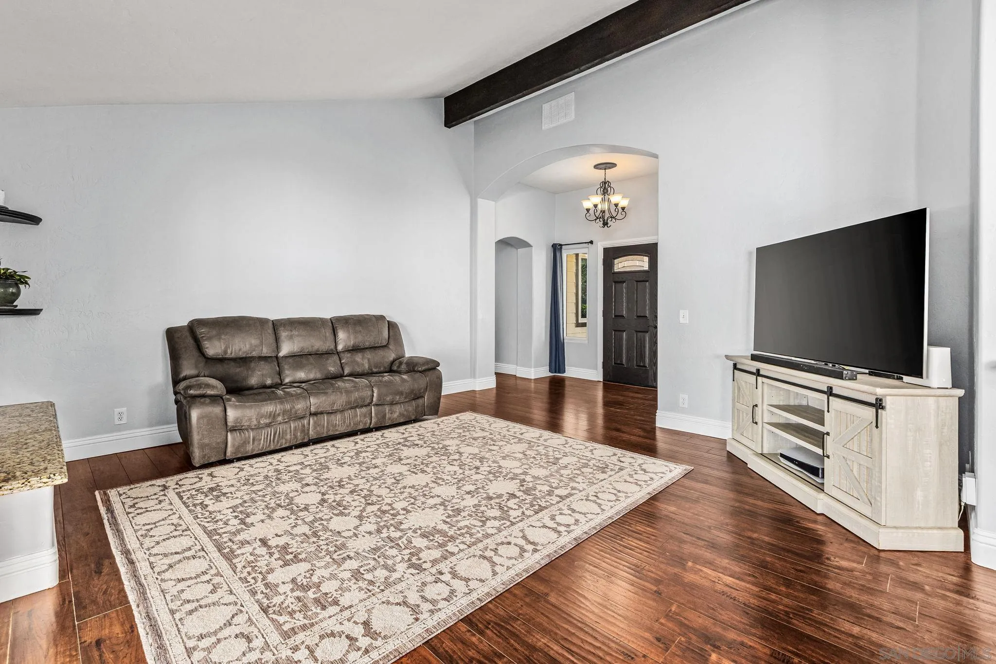 16319 Scarbery Road Ramona, CA 92065 - Photo 5 of 37 a living room with furniture and a flat screen tv