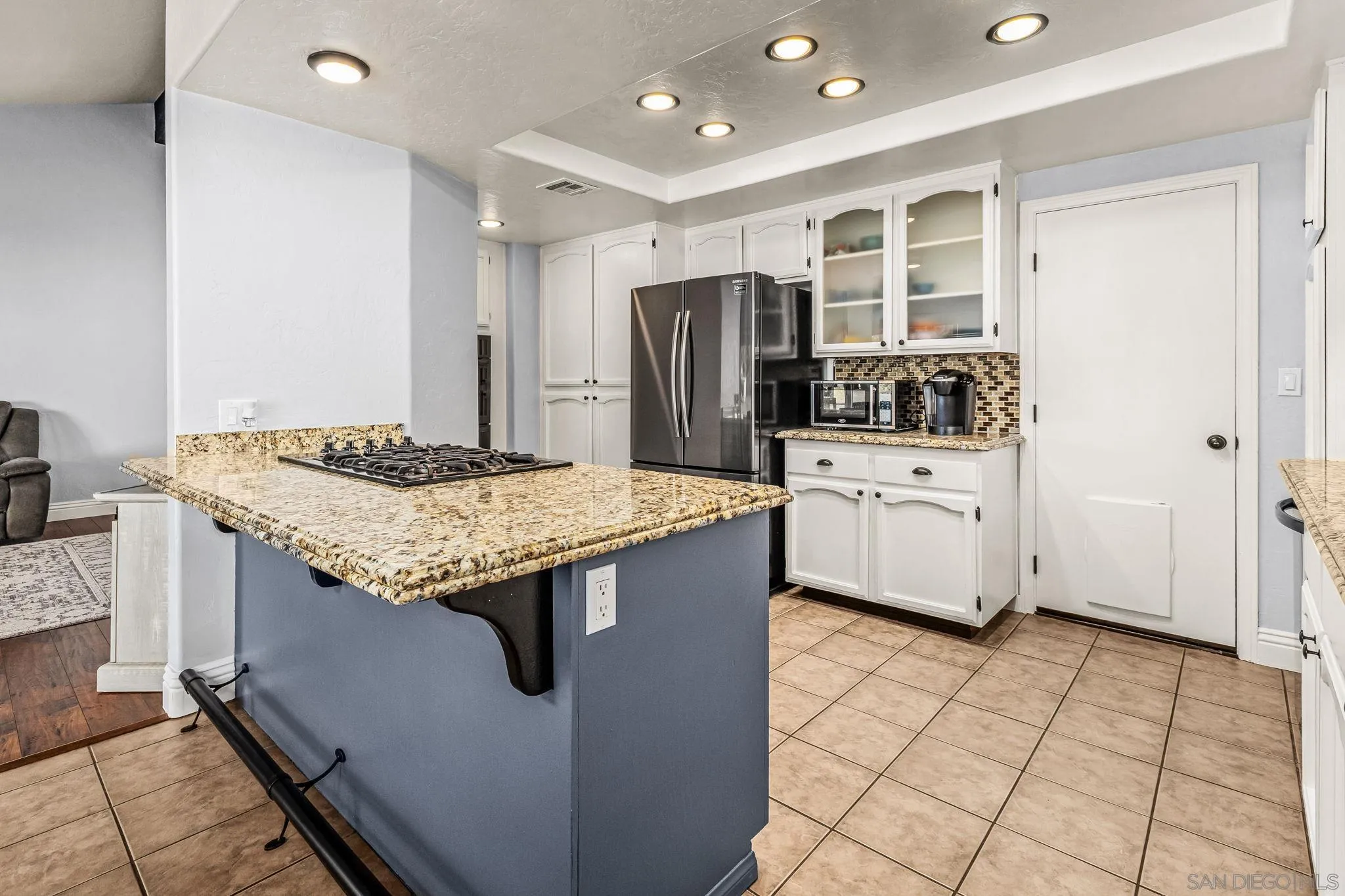 16319 Scarbery Road Ramona, CA 92065 - Photo 8 of 37 a kitchen with stainless steel appliances granite countertop a sink and cabinets