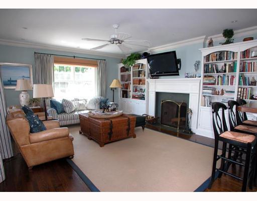 Undisclosed Address Old Greenwich, CT 06870 - Photo 5 of 8 a living room with furniture a fireplace and a flat screen tv