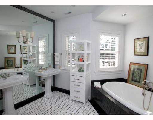 Undisclosed Address Old Greenwich, CT 06870 - Photo 8 of 8 a en suite spacious bathroom with a tub double vanity and windows