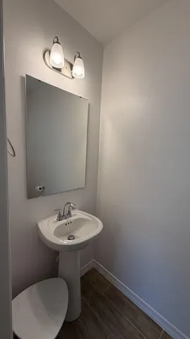 a front view of a house with a large space