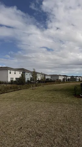 a front view of a house with garage