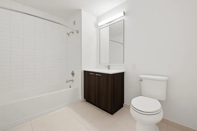 a kitchen with stainless steel appliances a stove and a refrigerator