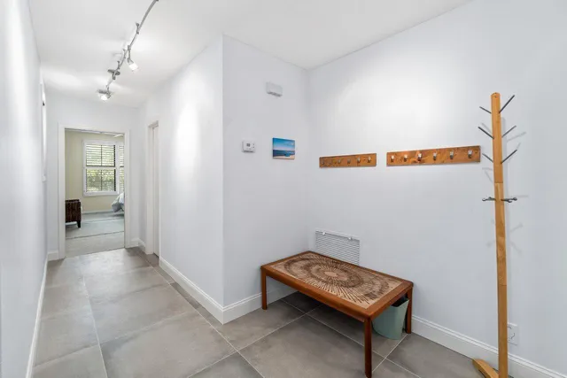 a view of a hallway with workspace