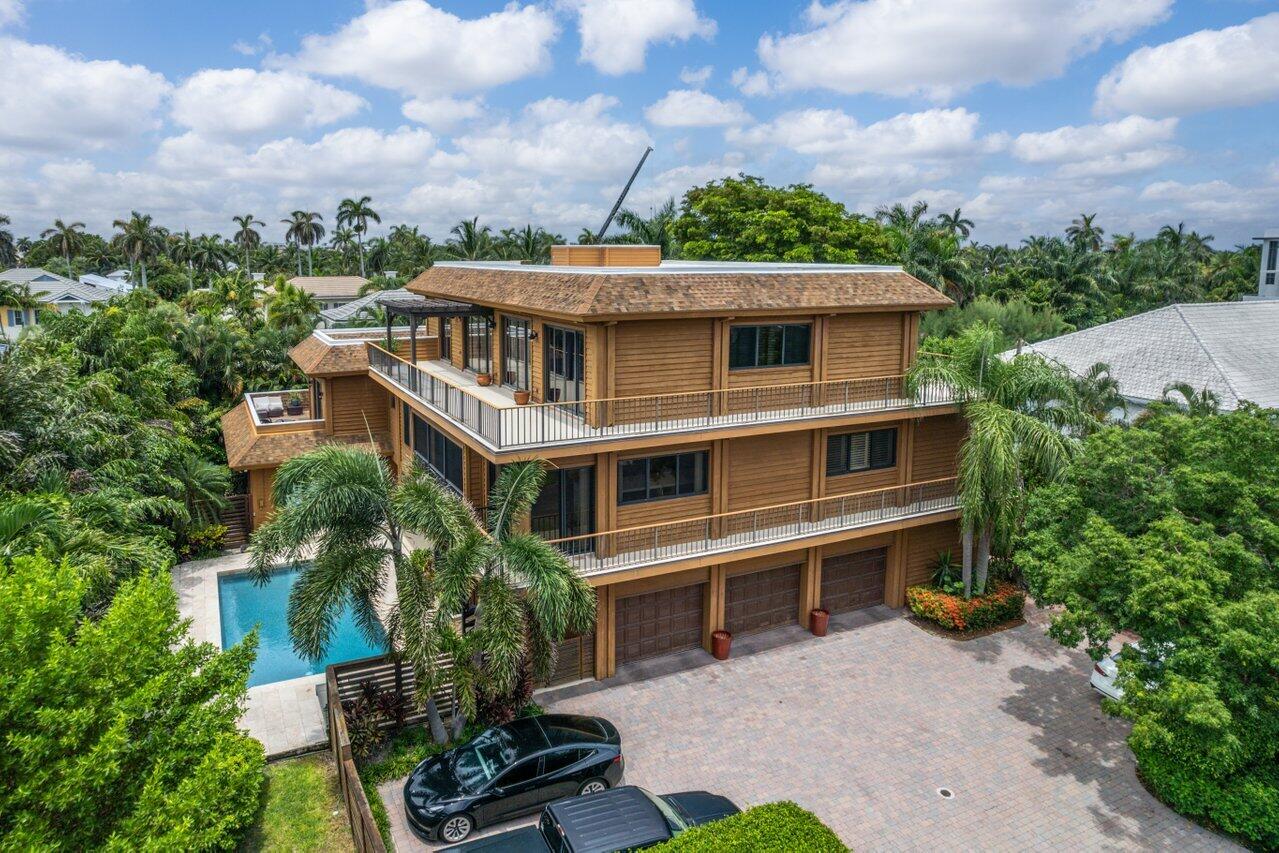 122 Andrews Avenue, Unit 2A Delray Beach, FL 33483 - Photo 2 of 39 an aerial view of a house with a yard