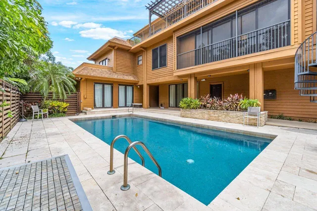 a view of a house with a swimming pool