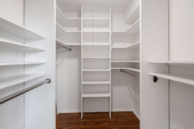 2 Hawthorne Place, Unit 16M Boston, MA 02114 - Photo 22 of 36 a view of walk in closet with empty racks