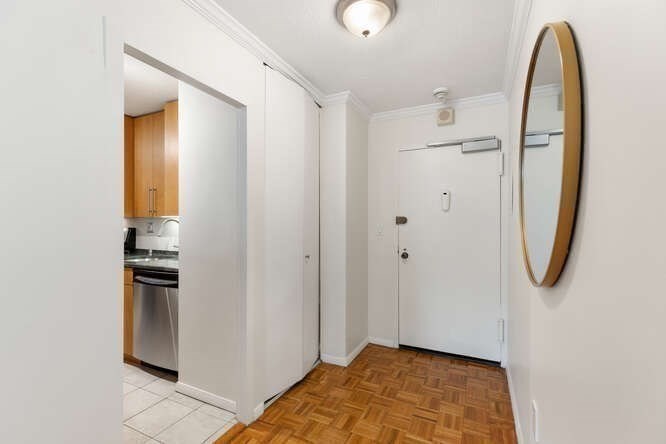2 Hawthorne Place, Unit 16M Boston, MA 02114 - Photo 8 of 36 a view of a room with wooden floor and bathroom