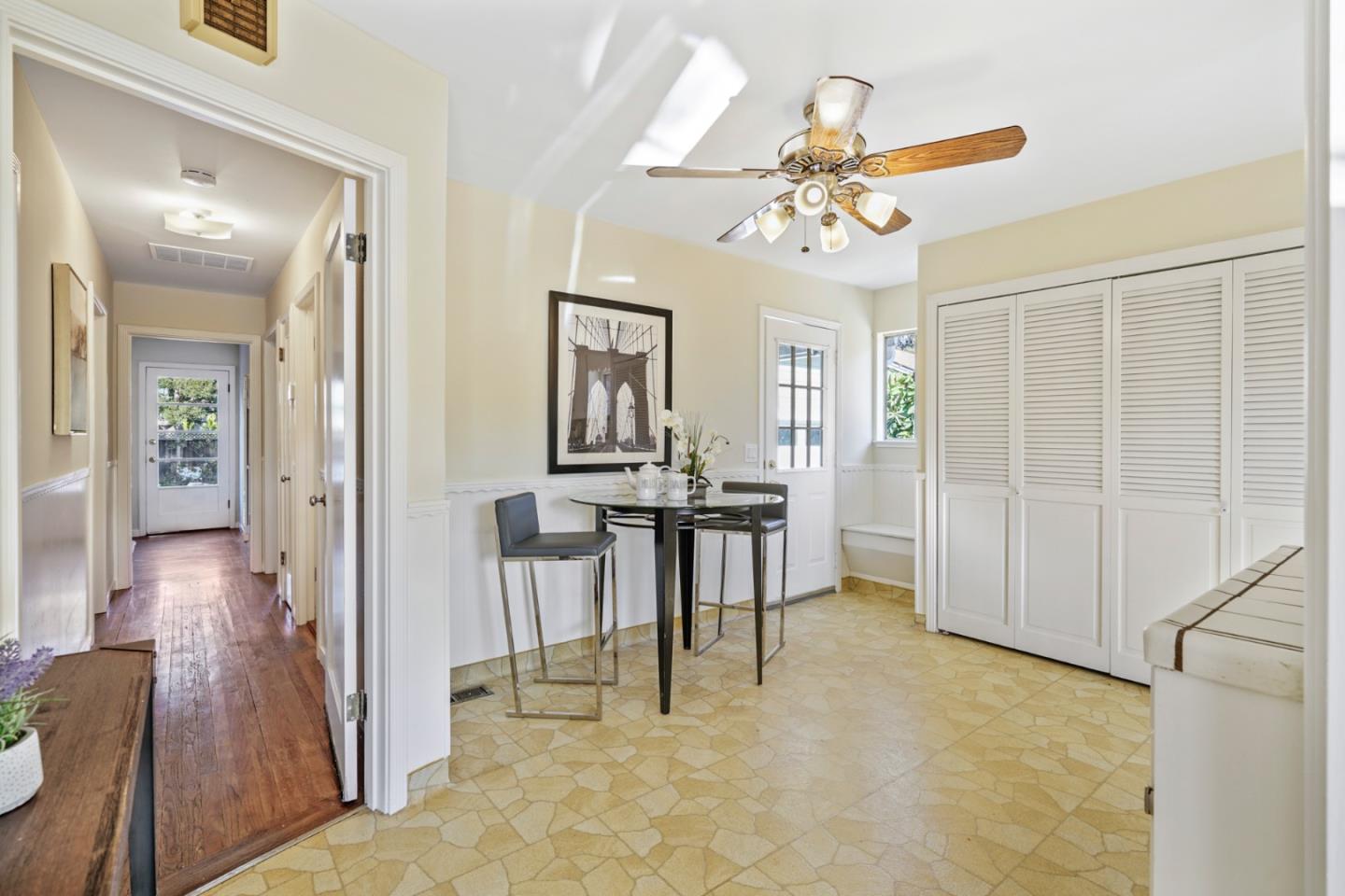 3755 Bay Road Menlo Park, CA 94025 - Photo 14 of 29 a view of a livingroom with furniture and a chandelier fan