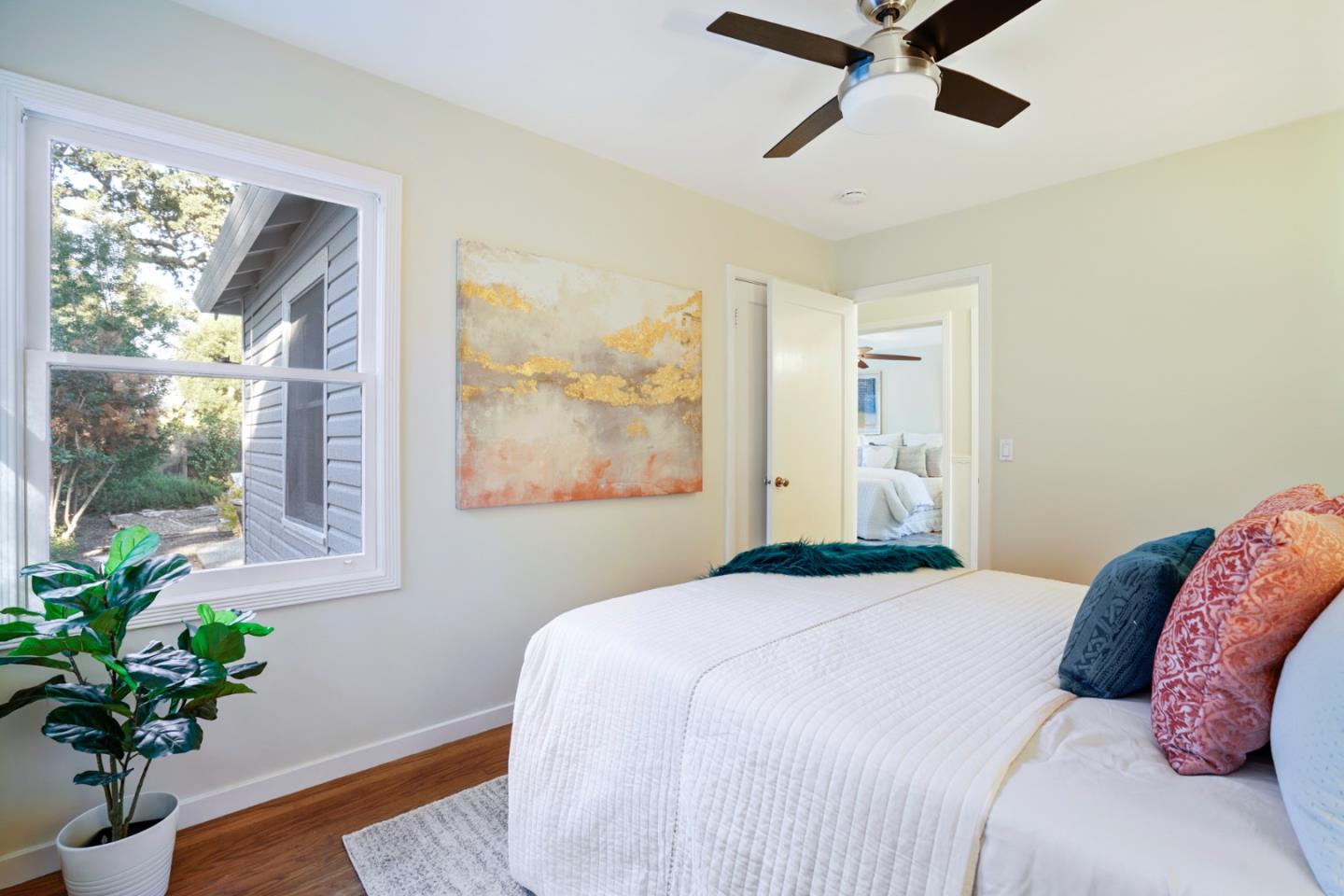 3755 Bay Road Menlo Park, CA 94025 - Photo 16 of 29 a bedroom with a bed and a potted plant