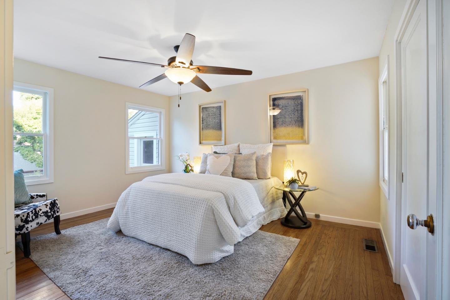 3755 Bay Road Menlo Park, CA 94025 - Photo 17 of 29 a bed room with a bed and a chandelier